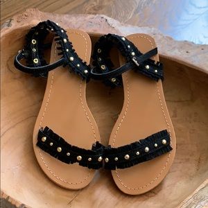 Almost brand new PEEK black and gold sandals